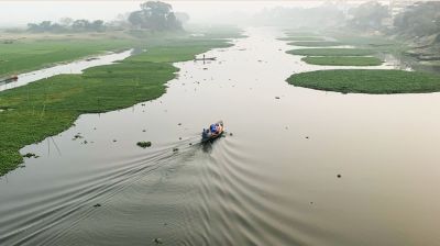 তিতাস নদীতে খননের নামে মাটি ‘লুট’